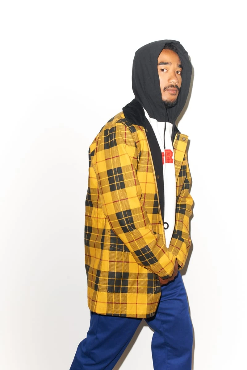 Lucien Smith in a yellow plaid coat and black hood for the SENSE Supreme Fall/Winter 2014 editorial